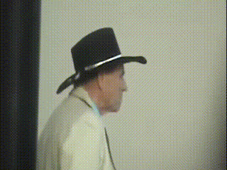 Merle Haggard entering backstage for concert as Terry Lee Hardesty and Dennis Morgan run security_gif.gif